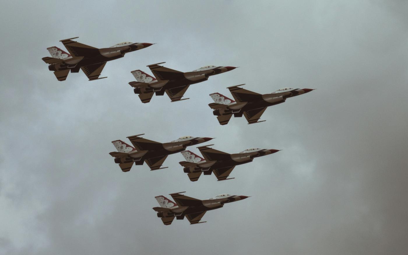 six fighter jets by UX Gun courtesy of Unsplash.