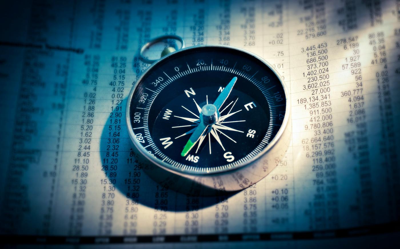 shallow focus photograph of black and gray compass by AbsolutVision courtesy of Unsplash.