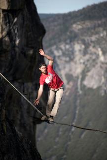 man waking on rope by Casey Horner courtesy of Unsplash.