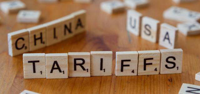 A close up of scrabble tiles spelling the word china by Markus Winkler courtesy of Unsplash.